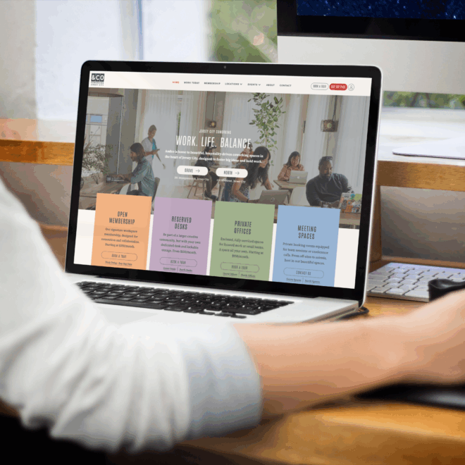 A close up of a laptop monitor showing the Andco website.